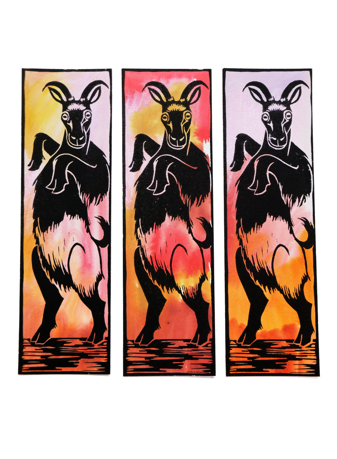 An exemple of 3 different versions of the handprinted linocut bookmark "Goat", made by Margo De Weerdt, artist and illustrator living in Strasbourg, France